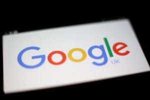 Google's logo on a mobile phone screen.