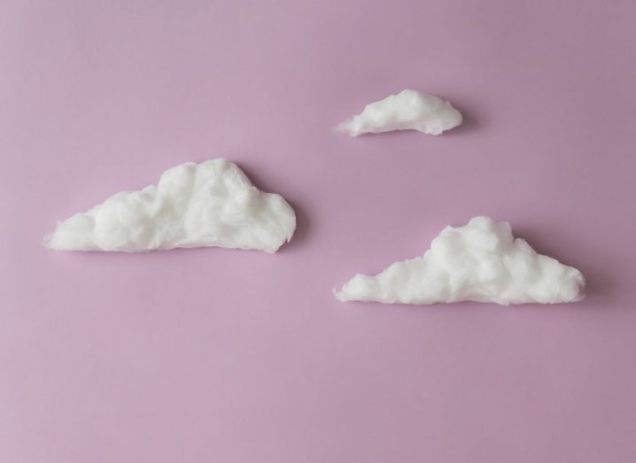 Cotton clouds on light purple background.