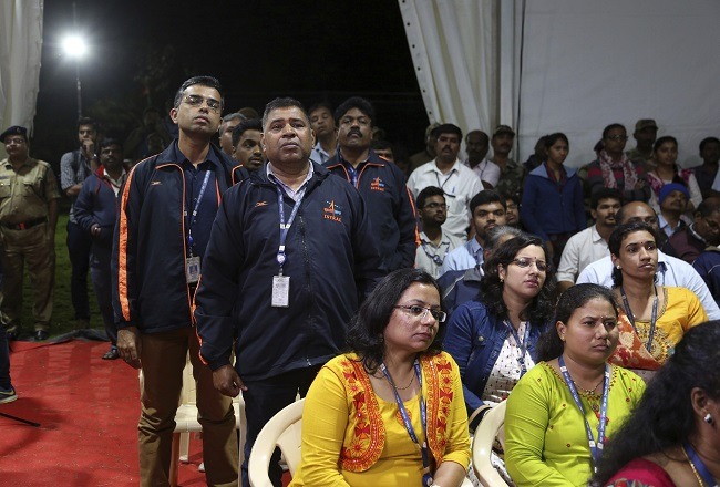 ISRO employees looking solemn after news of the failed landing was announced.