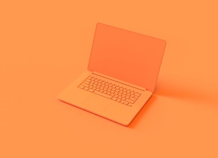 3D rendering of orange laptop against background of identical orange colour.