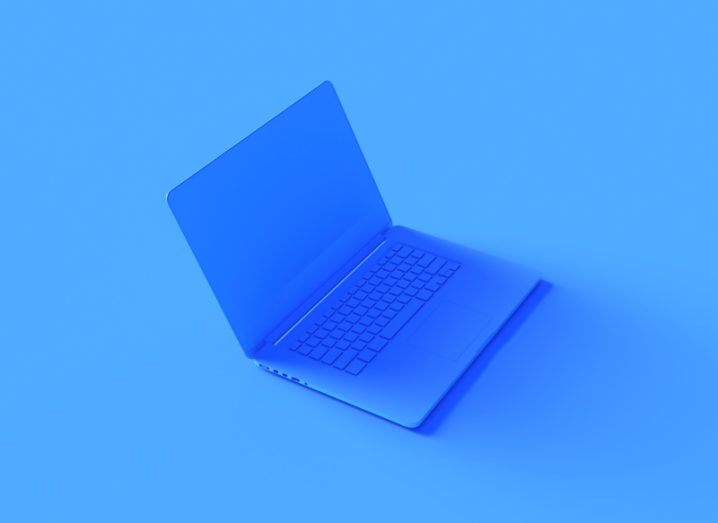 View of blue laptop 3D rendering on bright blue background.
