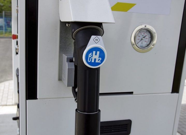 Close-up of a hydrogen fuel pump coloured white and black.