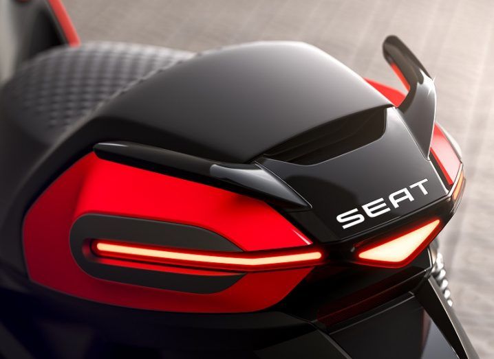 Close-up of the rear of the new SEAT eScooter bike, coloured black and red.