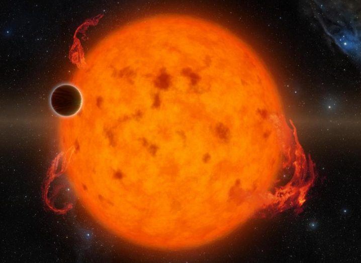 Large star with a small exoplanet to its left.