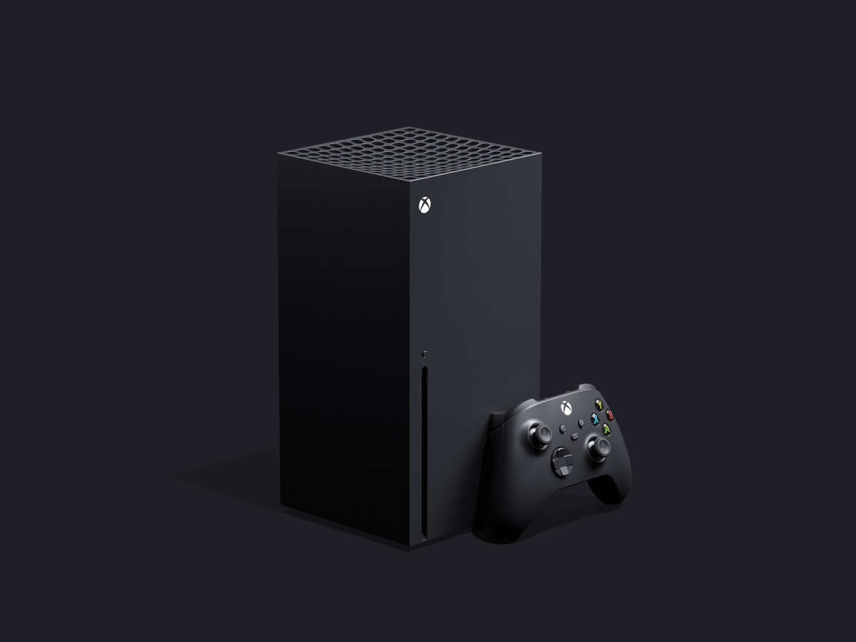 The new Xbox Series X console, which is a black pillar-shaped console.