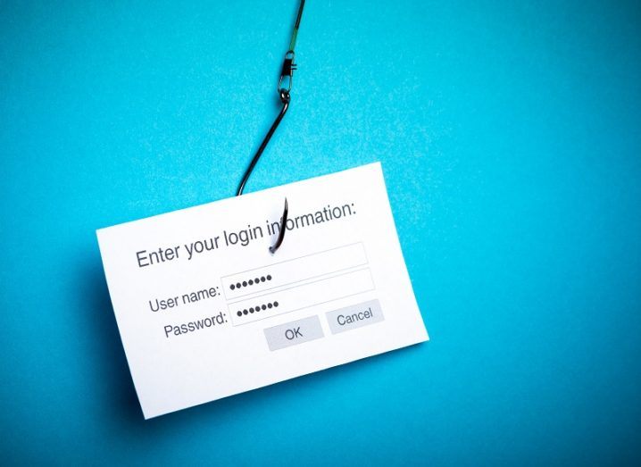 Concept image of a login screen connected to a fish hook against a light blue background.
