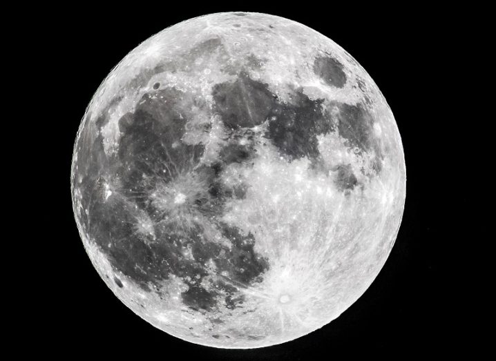 Image of a moon against a black sky background.