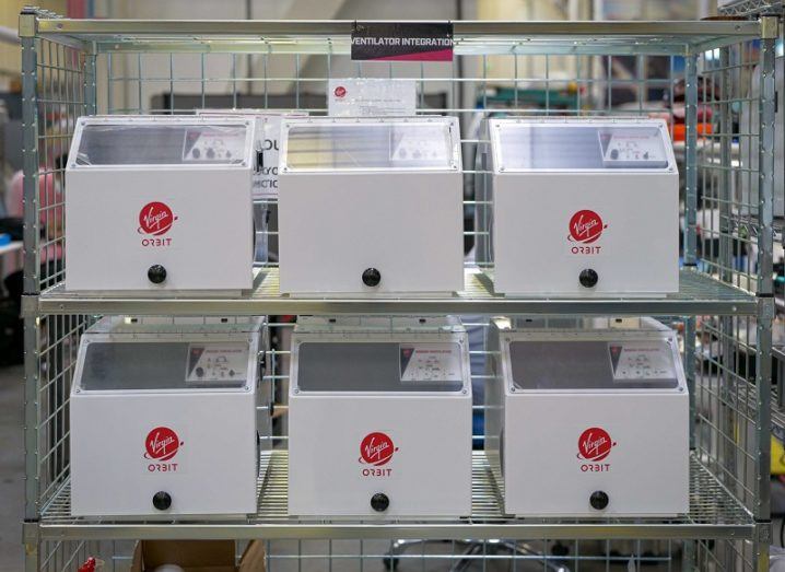 Six Virgin Orbit Ventilators on two shelves at its production facility.