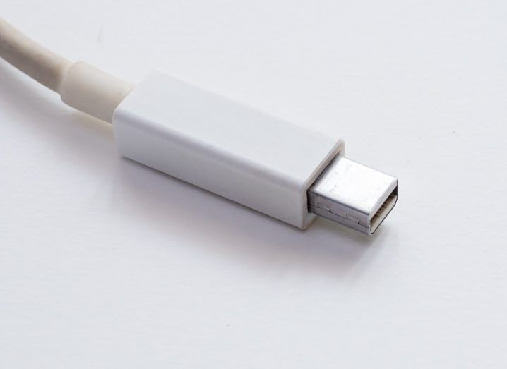 Close-up of a Thunderbolt cable against a white background.