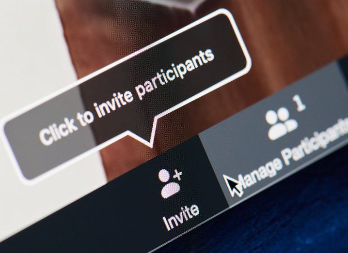 Close-up of a Zoom screen with the 'invite participants' option highlighted.