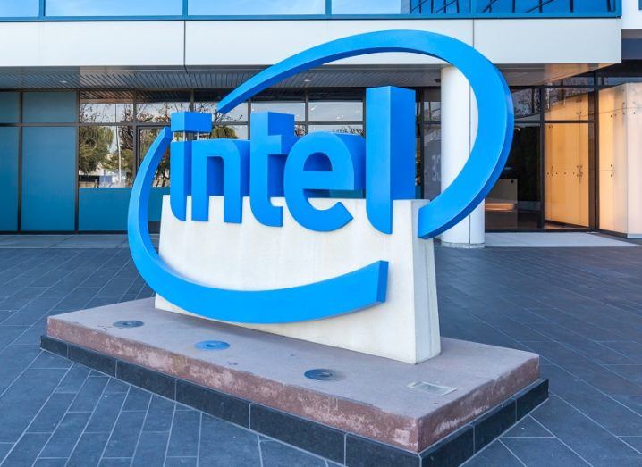 A blue Intel sign outside an office building.