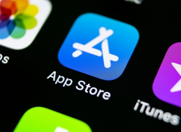 Close-up of the screen of an iPhone X showing the icon for the App Store.
