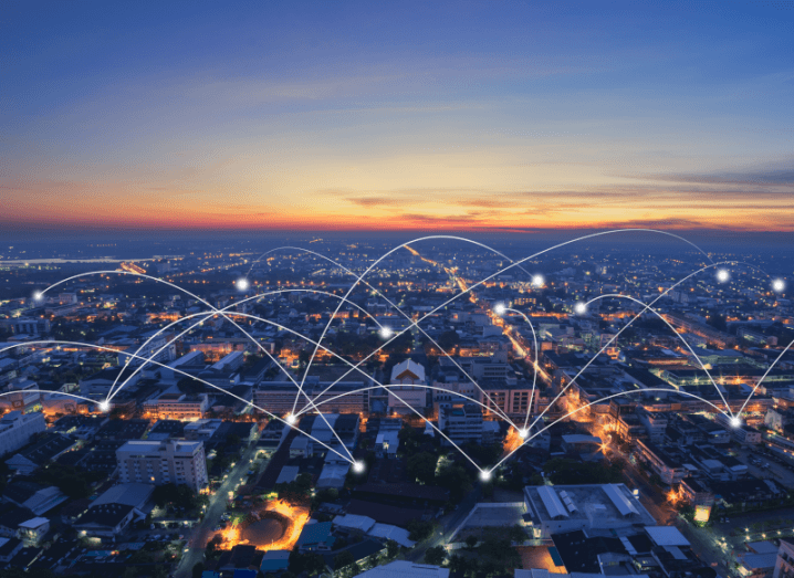 A city connected by lines to illustrate the concept of IoT devices.