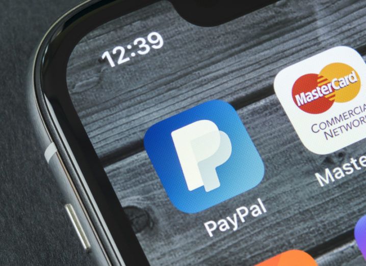 PayPal and Mastercard app icons on a smartphone screen.