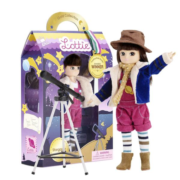 A Lottie doll standing next to a small telescope. Behind her is the packaged version in a box.