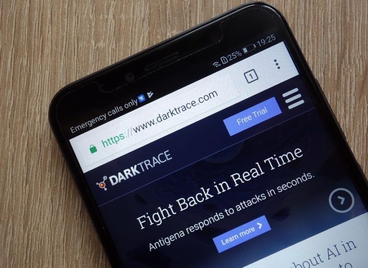 The Darktrace website is open on a mobile phone.