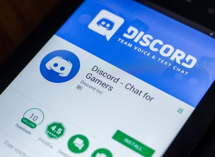 The Discord app is open on a phone screen.