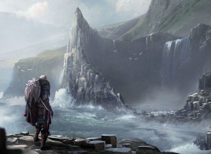 A Viking with weapons on his back stands in front of the Giant’s Causeway. The surrounding water is storming, and birds fly overhead, but the Viking remains unperturbed. Behind the Causeway are hills, covered in a mysterious fog.