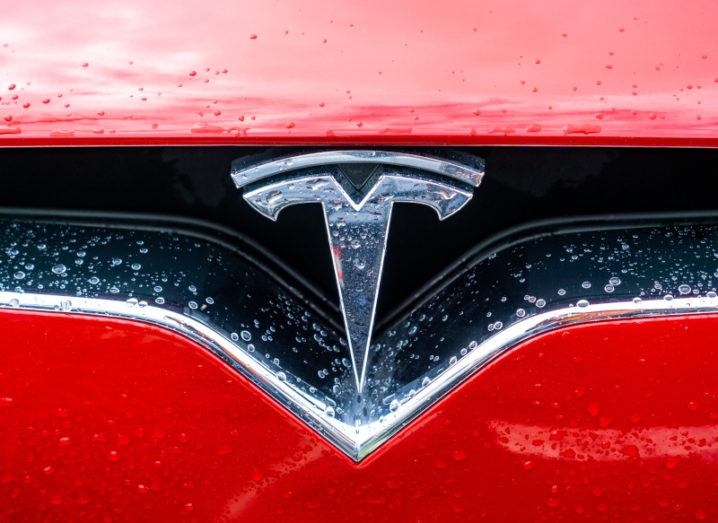 The Tesla logo on a Model X car.