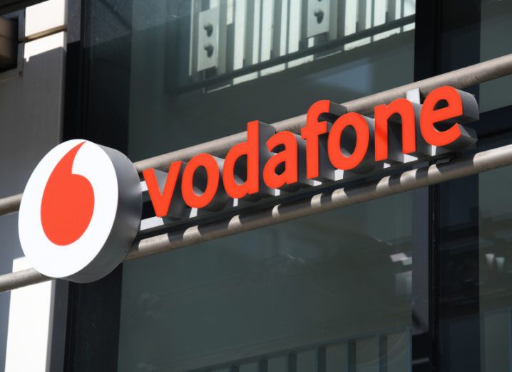 The Vodafone logo on a building.