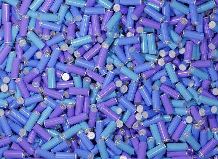 An expansive pile of batteries in blue and purple colours.