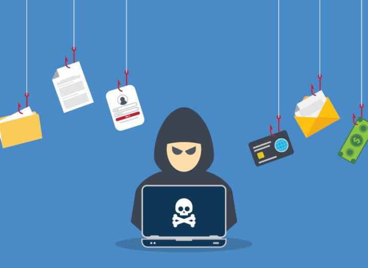 An animation of a cybercriminal in a black hoodie working on a laptop with a skull and bones on it. Files and money float on fishing hooks around his head.