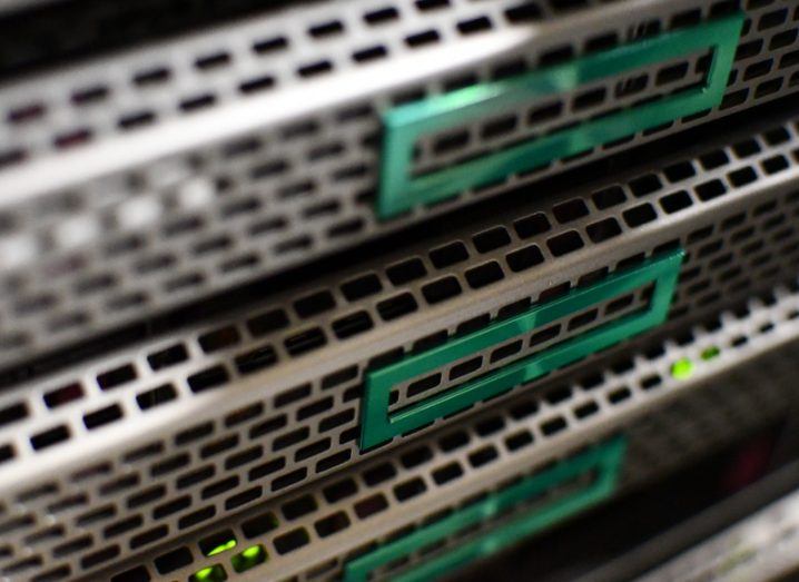 HPE logos on racks of servers.