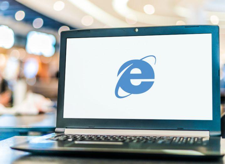 The Internet Explorer logo on a laptop screen.