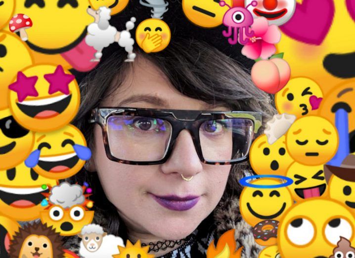 A woman's face is surrounded by different emoji graphics.