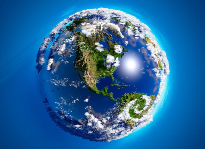 3D illustration of the earth showing North America and clouds surrounding it, set against a blue background.