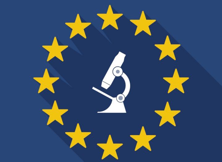 EU flag with a microscope in the middle, with the EU star symbols surrounding it.