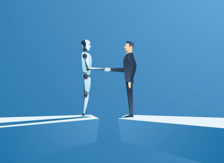 Concept art of a robot and a human shaking hands against a blue background.