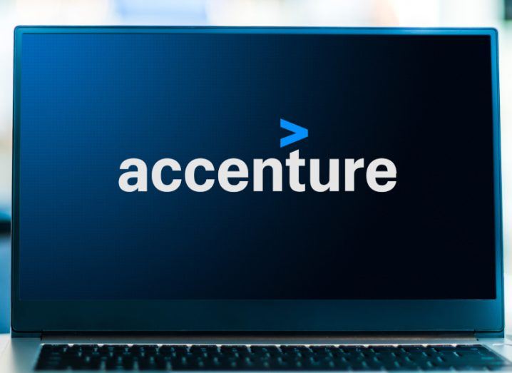 Laptop screen showing the Accenture logo.