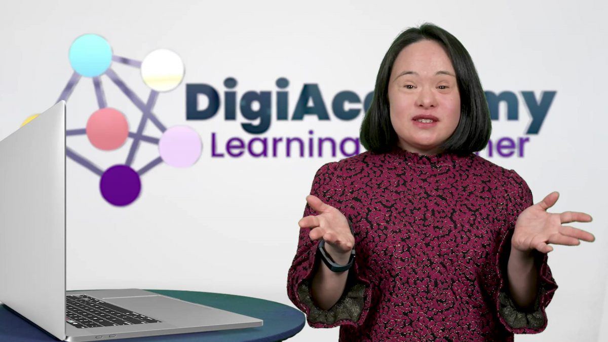 Digi-Academy instructor Mei Lin with the Digi-Academy logo in the background.
