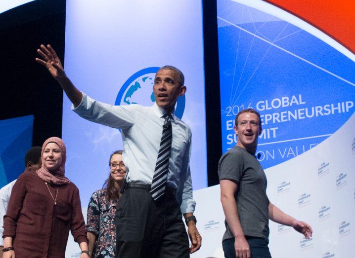 Barack Obama waves as he departs the stage of the Global Entrepreneurship Summit in Silicon Valley, alongside Facebook CEO Mark Zuckerberg.