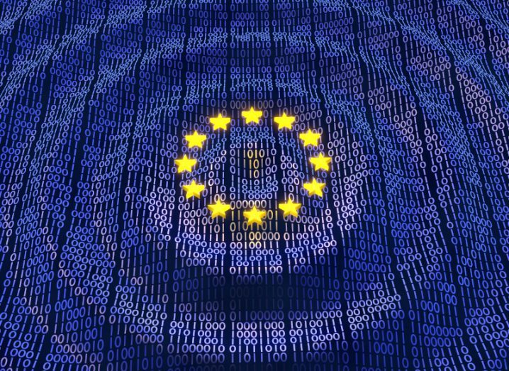 Illustration of rippling lines of binary code with a circle of golden stars in the centre representing the European Union flag.