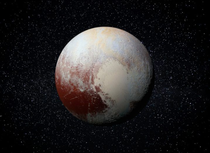 The dwarf planet Pluto with its ruddy surface and heart-shaped element against a backdrop of stars.