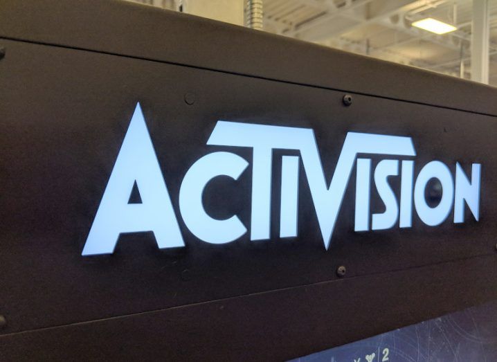Activision logo. on a black background in a store.