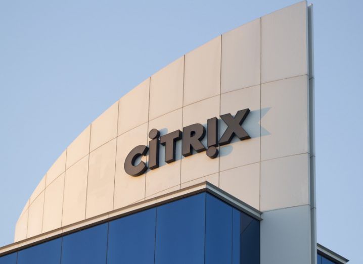 Citrix logo on a building with blue sky in the background.