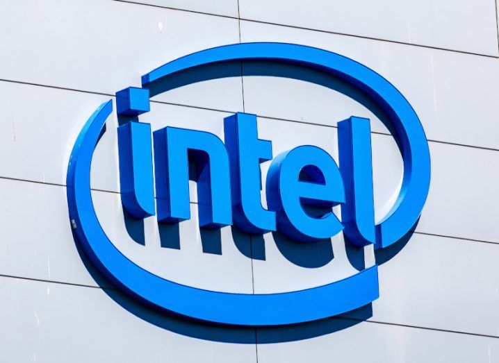 Close-up of blue Intel logo on a white building.