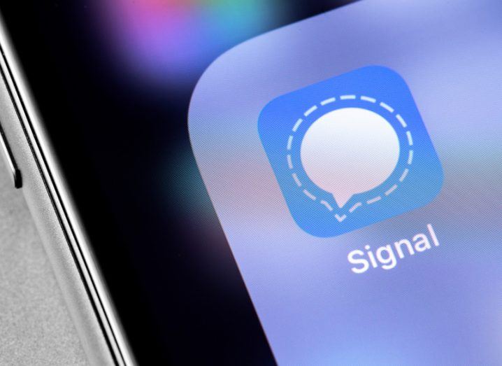 Close-up of Signal app icon on a smartphone screen.