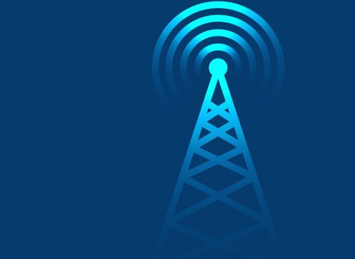 A vector image of a blue cellular tower emitting radio waves against a navy background, symbolising 5G.