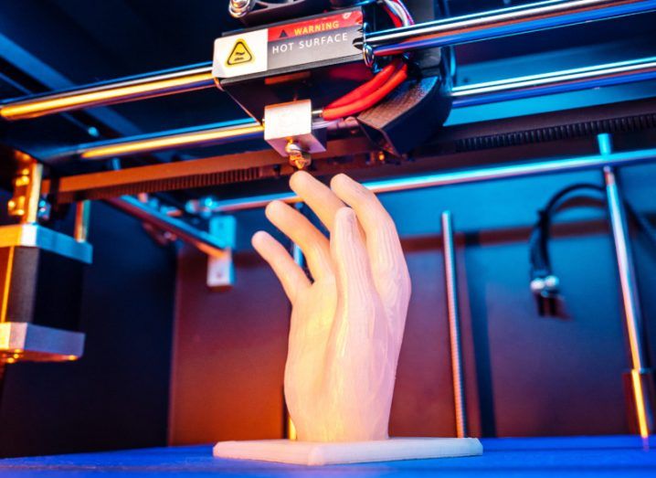 Image of a 3D printed robot hand that looks like a human hand.