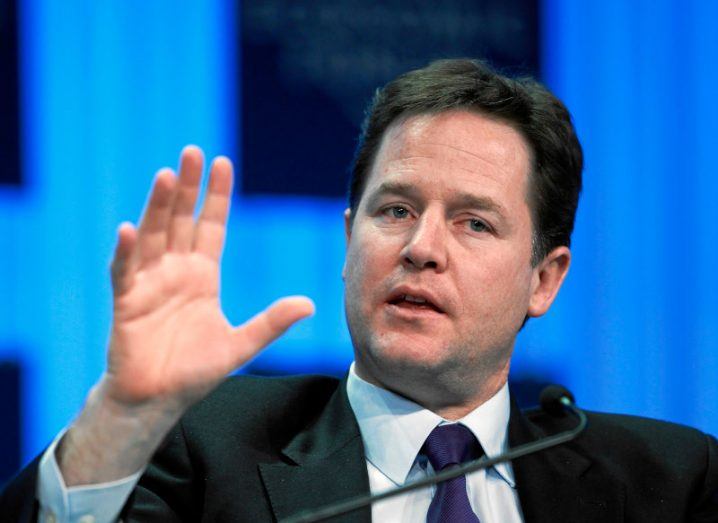 Close-up of Nick Clegg gesturing his hand while talking at a summit.
