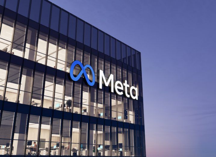 The Meta logo on an office building.