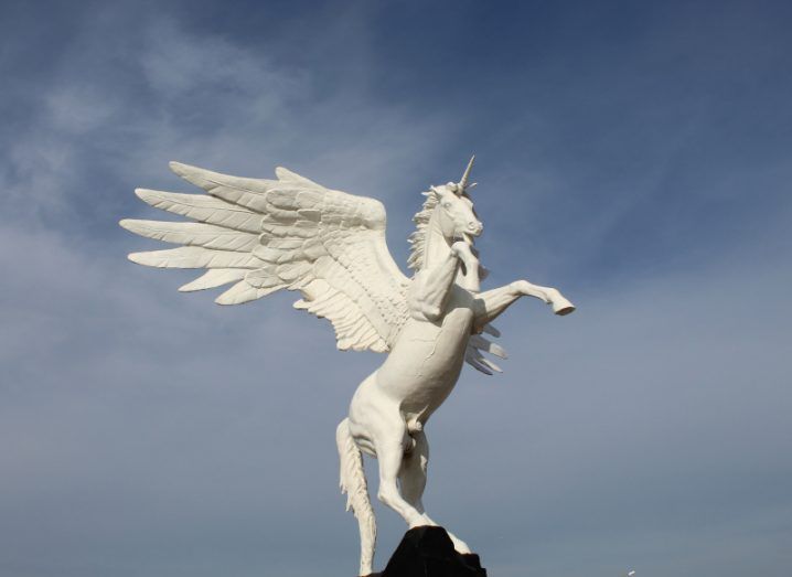 Statue of a pegasus rearing on its hind legs.