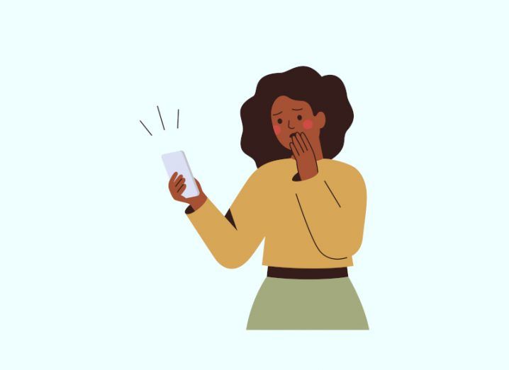 A cartoon woman looking at her phone, with a shocked expression on her face.