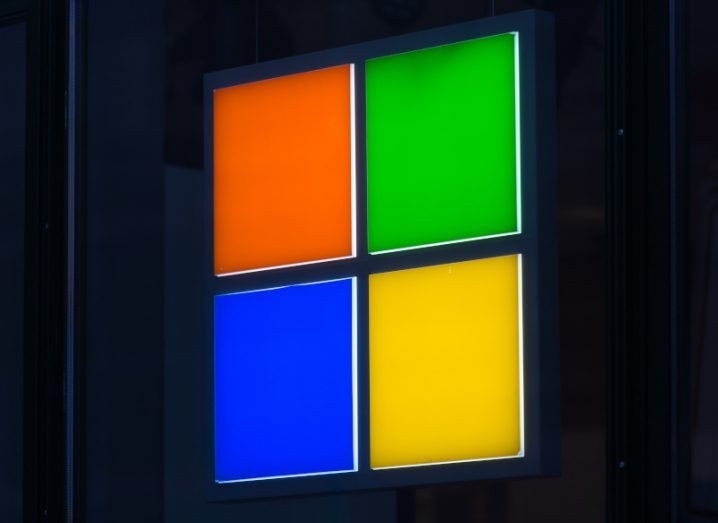 Close-up of Microsoft logo consisting of four different coloured squares making one big square.