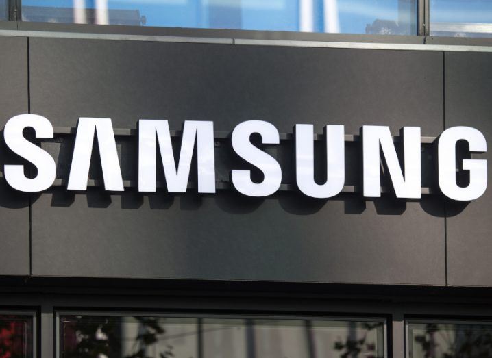 The white Samsung logo on a black sign.