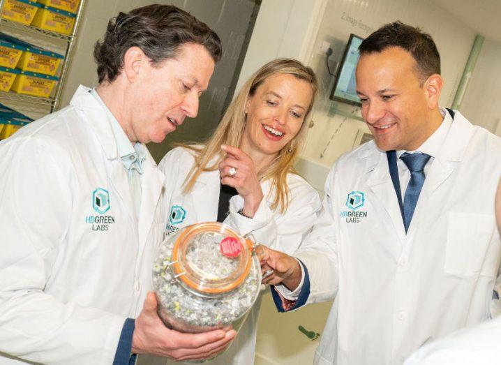 Jim Joyce, Audrey Derveloy and Leo Varadkar are wearing lab coats at the opening of the HealthBeacon Green Labs.